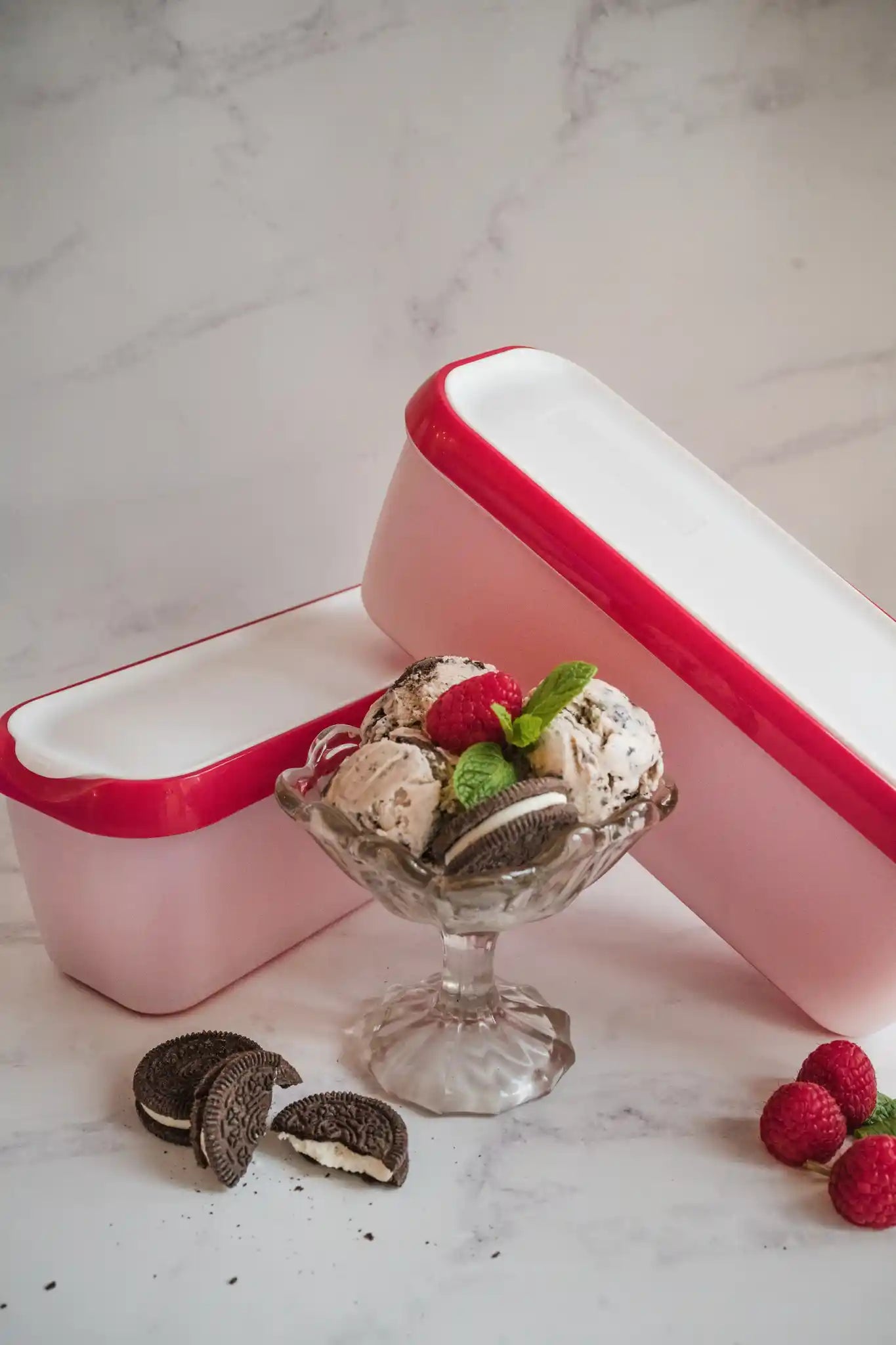 Starpack ice cream freezer storage containers with colorful, leak-proof silicone lids, designed for easy stacking and frost-free storage.